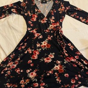 Low cut Navy Blue dress with flower pattern, knee-length